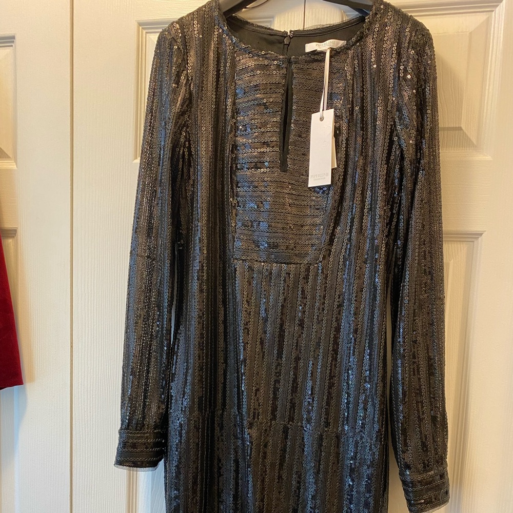 NWT Piperlime Collection Black Sequin Long Sleeves Dress with button cuffs.